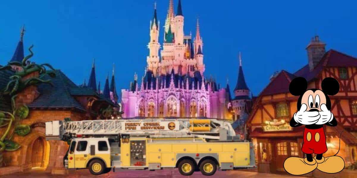 Mickey Mouse stands beside a yellow fire truck in front of Cinderella Castle at Disney World, the scene illuminated with vibrant lights and buzzing with the thrill of an unexpected Peter Pan's Flight evacuation.
