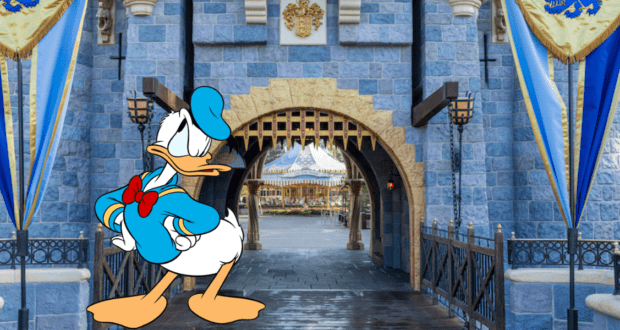 Donald Duck greets fans in front of Disneyland’s iconic blue castle entrance, decorated with festive banners and located just steps from the beloved Blue Bayou restaurant.