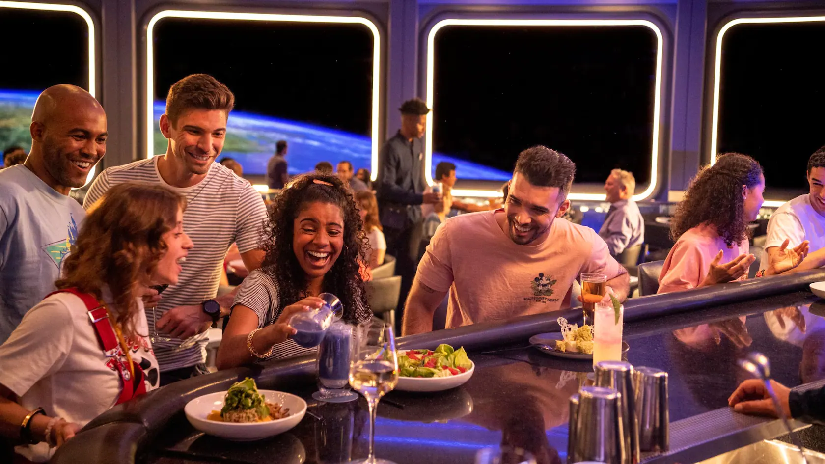 guests sitting at the bar in space 220