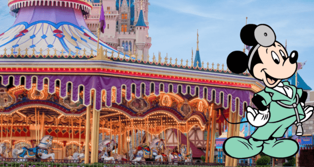 Nurse mickey in front of the carousel