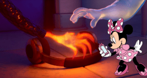 Minnie Mouse, dressed in her signature pink, examines a flaming wire as a magical, ghostly hand—evoking the wonder of Pixar’s Elemental effects—reaches dramatically toward the fire.