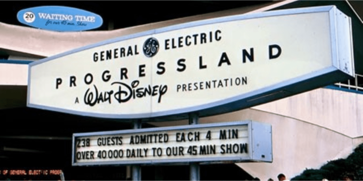 The Progressland sign, showcasing “Walt Disney Presentation,” highlights guest admission details and show information, capturing the excitement and innovation that defined Disney’s World’s Fair attractions.