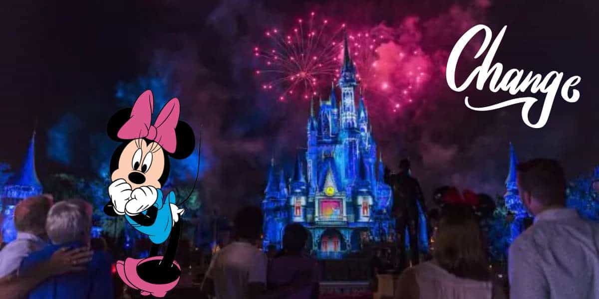 Minnie Mouse joins guests gathered beneath a dazzling fireworks display above the illuminated Disney World castle, soaking in the enchantment of extended park hours. The word "Change" appears overhead.