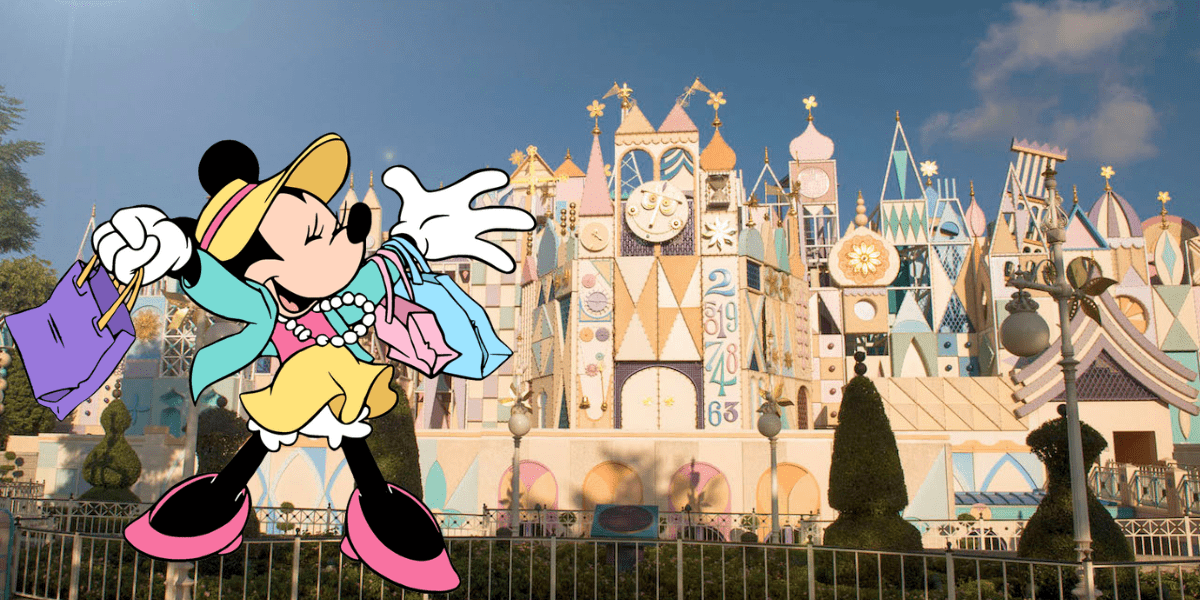 Minnie Mouse shows off her latest shopping finds while posing in front of the iconic "it's a small world" attraction at Disneyland, capturing the magic and excitement of a day at the park.