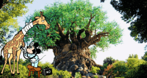 Mickey Mouse, dressed as a doctor, checks on a giraffe with a bandaged leg near an impressive Animal Kingdom tree featuring carvings of beloved park animals.