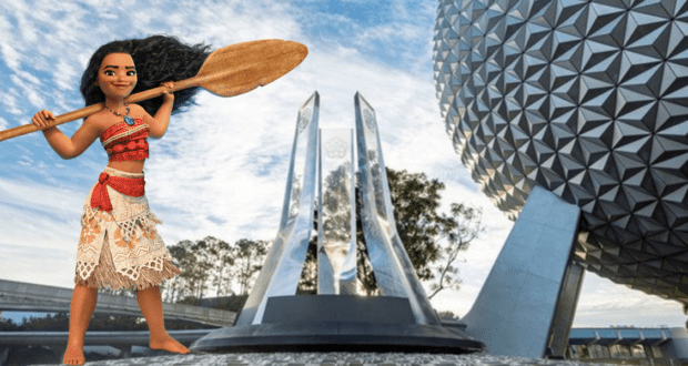 Moana, paddle in hand, poses in front of Epcot’s iconic Spaceship Earth and sparkling glass pylons beneath a vibrant blue sky, highlighting the Journey of Water experience at Epcot.