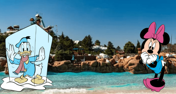 Donald Duck is encased in ice as Minnie Mouse watches with concern at Disney’s Blizzard Beach, surrounded by colorful water slides and wintry décor, capturing the park’s signature frosty fun atmosphere.
