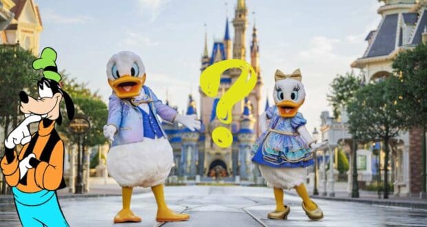 Goofy looks confused next to Donald and Daisy Duck in front of the iconic Disney World castle, as a big question mark hovers between them, highlighting the anticipation of beloved Disney Characters coming back to the park.