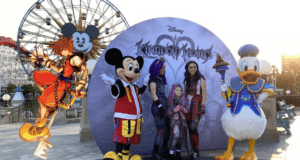 Fans join Mickey Mouse, Donald Duck, and Kingdom Hearts characters for a memorable photo op during an electrifying Disney Parks celebration.
