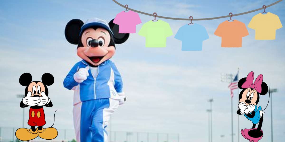 Mickey Mouse sports a stylish blue tracksuit alongside Minnie, with collectible Disney shirts displayed above, set against a vibrant theme park backdrop.