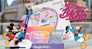 Disneyland Magic Key welcome package showcasing exclusive Magic Key passes and cards, with Mickey, Minnie, and Donald Duck greeting fans alongside a festive "Welcome Back" message—perfect for Disney enthusiasts experiencing the magic of the parks.
