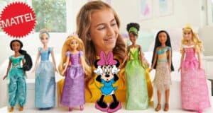 A young fan beams at a display of six Disney Princess dolls by Mattel, featured alongside a Minnie Mouse graphic and the official Mattel logo—capturing the magic of beloved Disney icons celebrated in family entertainment venues.