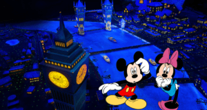 Mickey and Minnie Mouse gaze out from beside a glowing Big Ben, taking in the vibrant, illuminated London skyline at night. As they reminisce about their magical Disney adventures, Mickey jokes that nothing quite compares to the excitement of Peter Pan’s Flight—even if some experiences just don’t measure up.