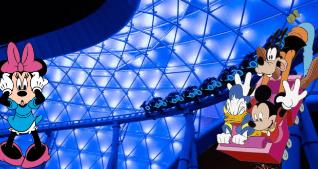 Beloved Disney characters race through the high-speed thrills of Tron Lightcycle Run beneath a futuristic, glowing blue canopy, while Minnie Mouse looks on in amazement.