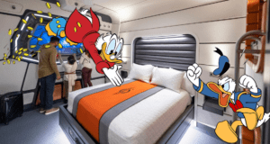 Scrooge McDuck and Donald Duck enjoy an immersive stay aboard the Star Wars: Galactic Starcruiser, interacting with fellow guests as golden coins float through the air inside their high-tech hotel room.
