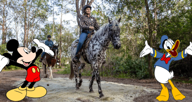Mickey Mouse and Donald Duck sparkle in vivid hues, their appearances inspired by recycled glass art from Walt Disney World, as two horseback riders make their way along a serene wooded trail in the background.