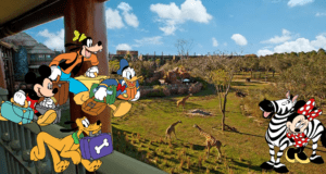 Mickey Mouse and friends, suitcases in hand, gaze over an African-inspired savanna teeming with giraffes and zebras beneath a vibrant blue sky, capturing the excitement of a Disney World Resort hotel adventure—now even more enchanting with special savings.
