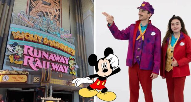 The entrance to Mickey & Minnie's Runaway Railway at Disneyland, featuring the vibrant attraction sign, Mickey Mouse greeting guests, and two Disneyland Cast Members in red uniforms ready to welcome visitors.