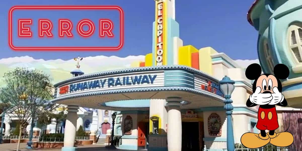 Whimsical cartoon building at Mickey & Minnie's Runaway Railway entrance in Disney World, featuring a bold "ERROR" sign above the doorway and a wide-eyed, surprised Mickey Mouse nearby.