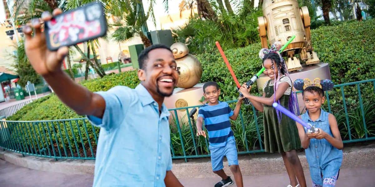 Family Poses for Selfie at Disney World in Central florida 