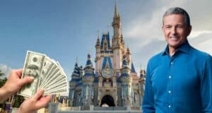 A cheerful guest poses in front of Cinderella Castle at Disney World, while a hand displaying cash in the foreground points to evolving ticket prices under Bob Iger's leadership, all set against a sunny blue sky.