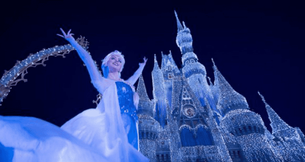 Elsa in Front of "Frozen" Cinderella Castle