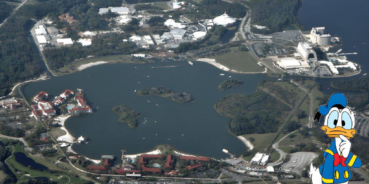 Aerial view of Epcot at Disney World, part of the sprawling 43 square miles that make up the size of Disney World, showcasing a large central lake with various buildings and attractions around it. Donald Duck, in his classic sailor outfit, is illustrated in the bottom right corner. Lush greenery and roads surround the site.