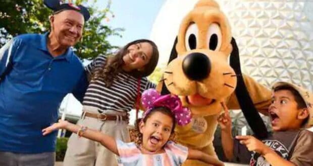 Family with Pluto at EPCOT