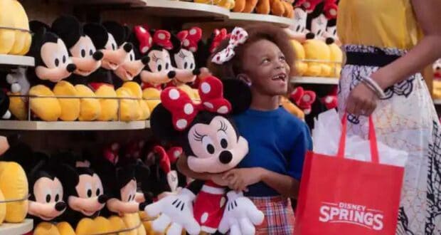 Girl Holding Minnie Mouse at Disney Springs
