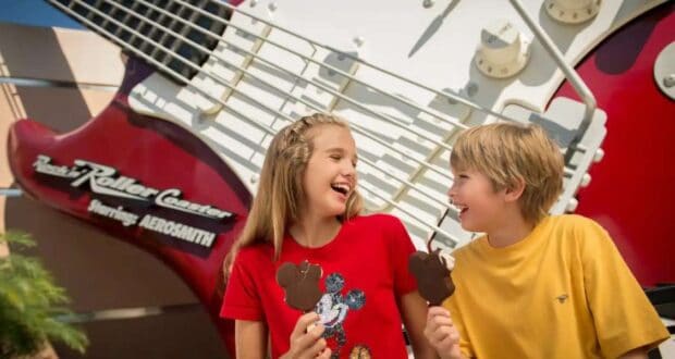 Kids eating Mickey Ice Cream outside Rock N Roller Coaster