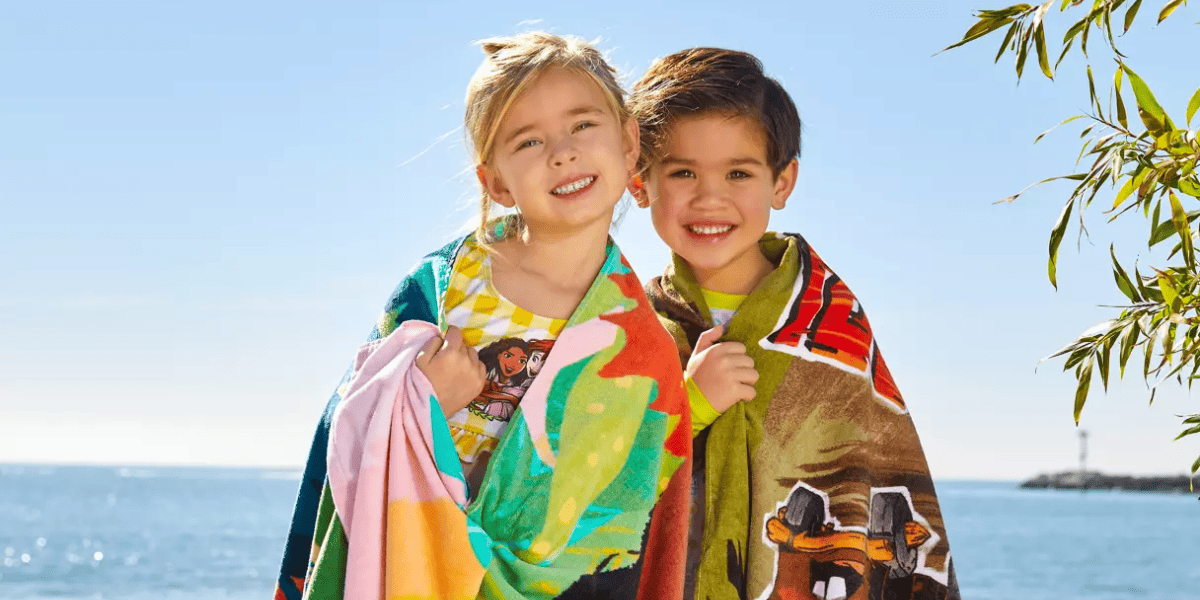 Kids wearing Disney-themed towels