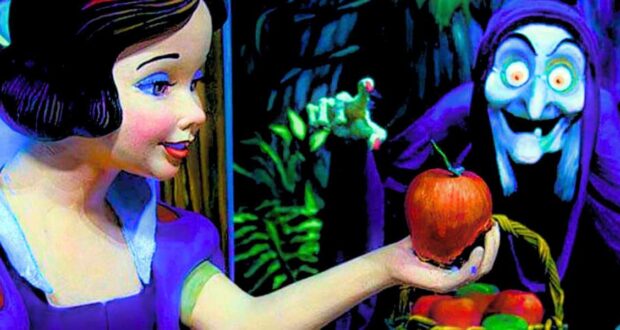 Witch handing Snow White Apple