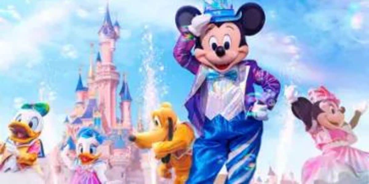 Mickey Mouse in front of Sleeping Beauty Castle at Disneyland Paris