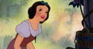 A cartoon princess reminiscent of the New Snow White, with short black hair and a blue hairband, looks up. She wears a dress with puffed sleeves and stands against a soft, painted background of green and brown hues.