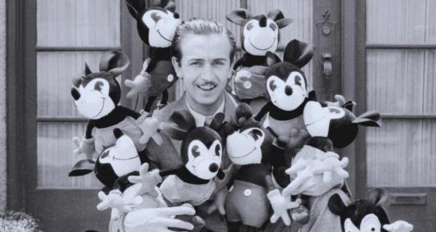 Walt Disney with Mickey Mouse dolls