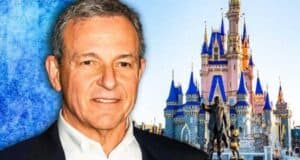 Iger smiling with Disneyland park on his right