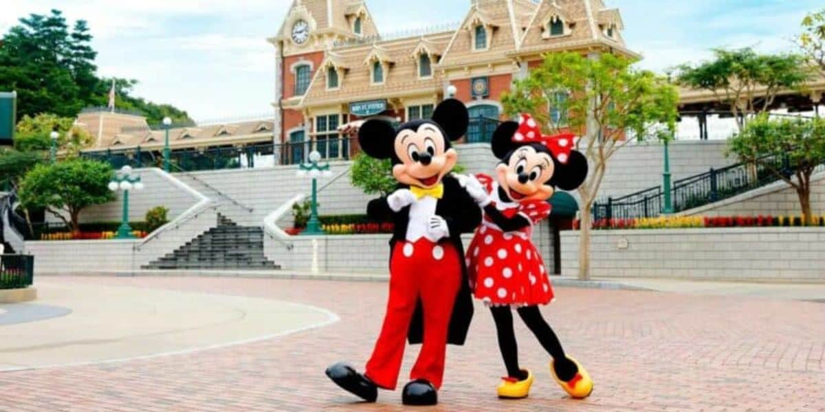 Mickey and Minnie outside Disney train station