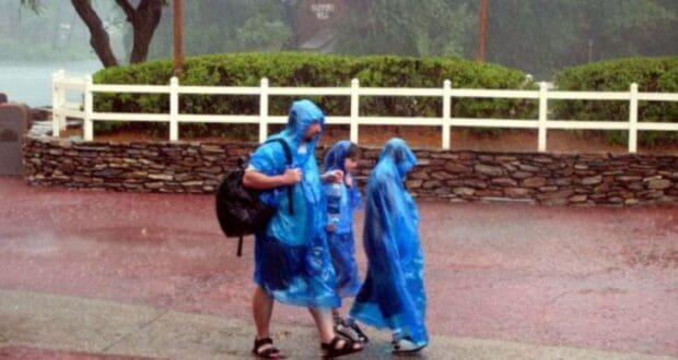 Family In The Rain Walt Disney World