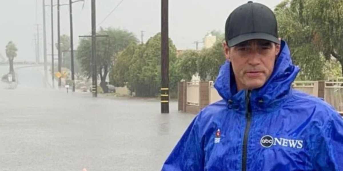 ABC New anchor standing in rain