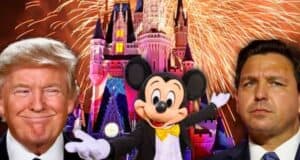 Donald Trump smiling while looking at and angry Ron DeSantis with Mickey Mouse in the middle at Disney World.