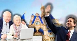 An elderly couple sits at a table, looking at a laptop with smiles. Behind them is a large castle reminiscent of a famous theme park castle. On the right side of the image, Governor DeSantis in a suit waves his hand, appearing to be smiling.