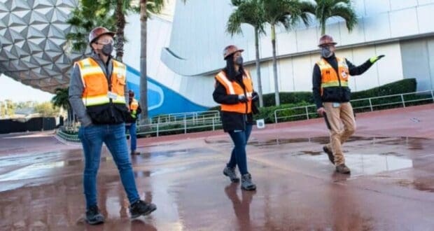 Barbara Bouza (middle) walking through EPCOT