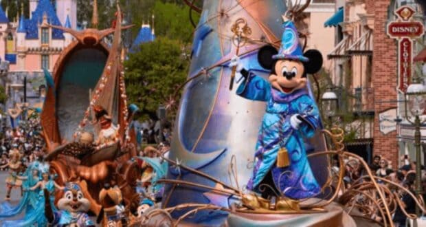 Mickey mouse leading the "Magic Happens" parade at Disneyland Park