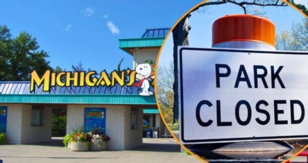 The image depicts the entrance of Michigan's Adventure, a renowned U.S. theme park, featuring Snoopy with clear skies and greenery in the background. An inset photo of a "Park Closed" sign with an orange reflector is shown on the right side of the image, hinting at an emergency shutdown or entry denied situation.