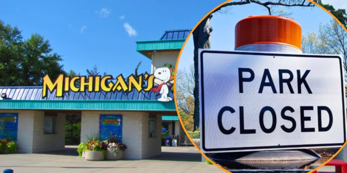 The image depicts the entrance of Michigan's Adventure, a renowned U.S. theme park, featuring Snoopy with clear skies and greenery in the background. An inset photo of a "Park Closed" sign with an orange reflector is shown on the right side of the image, hinting at an emergency shutdown or entry denied situation.