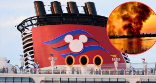 A cruise ship with Disney's iconic red funnel, featuring a white Mickey Mouse logo, sails calmly. Inset is a circular image of a large fire with thick black smoke billowing into the sky near a body of water.