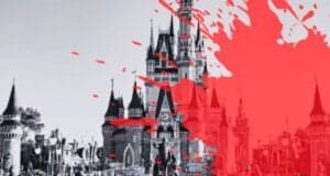 Black and white image of Disney World's castle with a splattered bright red paint effect on the right side, creating a stark, artistic contrast.