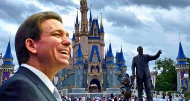 Governor DeSantis smiling broadly with an image of cinderella's castle at walt disney world.
