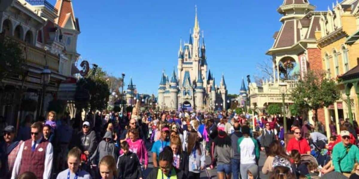 Crowds on Main Street U.S.A. at Disney World with Cinderella Castle in the background