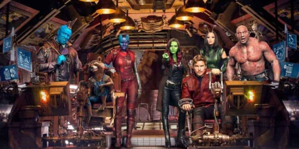 A group of seven diverse characters in a futuristic setting. They stand and sit in a spaceship, dressed in various colorful outfits. The background is filled with advanced technology and control panels.